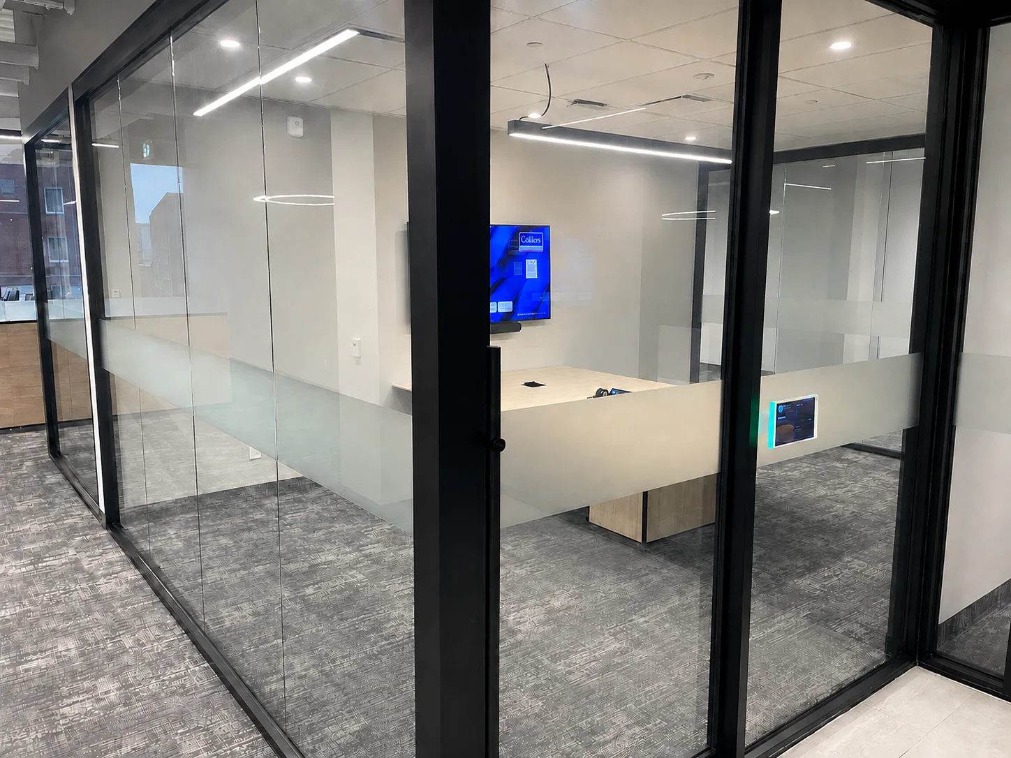 345 King Suite 200 glass office fronts with privacy banding, with reflections removed for privacy