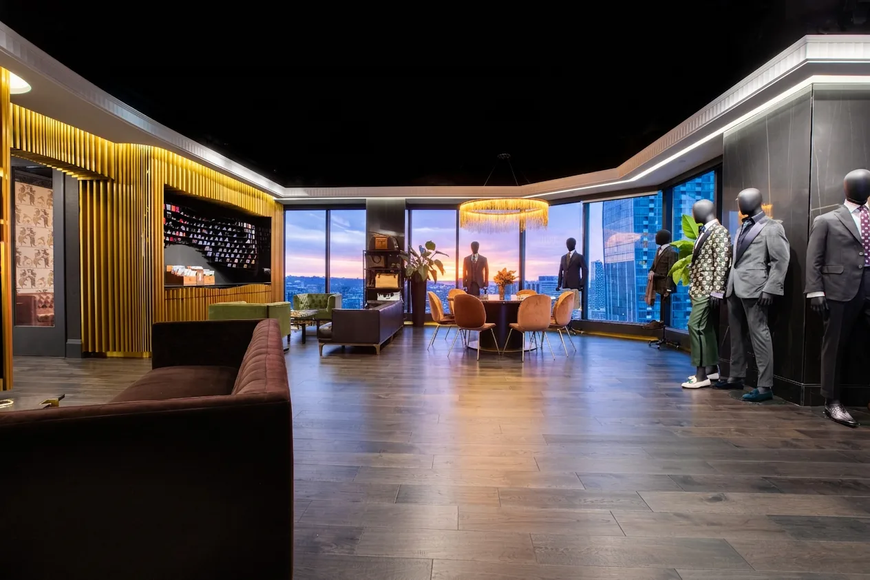 King & Bay showroom floor with mannequins, lounge seating and skyline windows