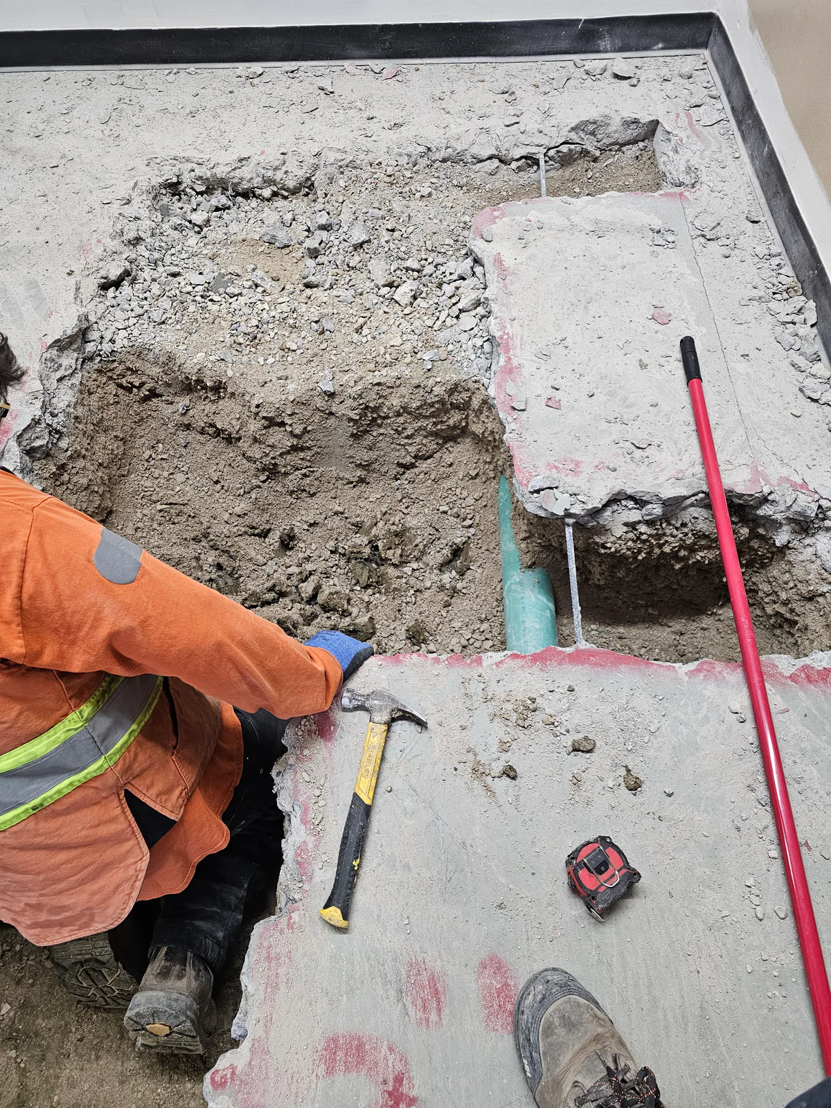Excavation progressing below the commercial washroom slab