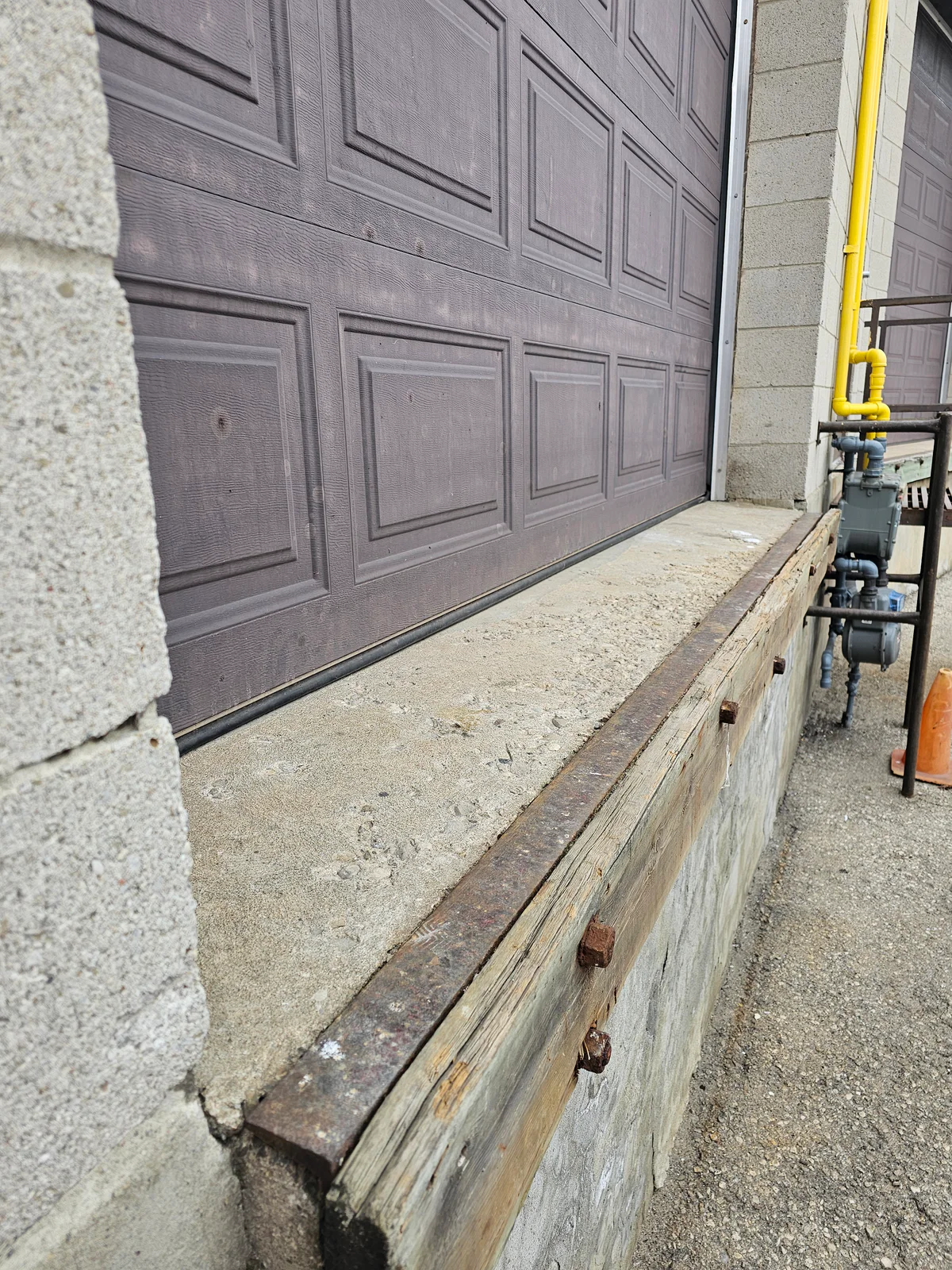 Unit 203 loading-area condition documented during the project